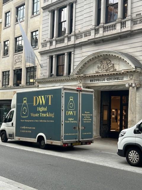 DWT collection van outside a stone-fronted store in Mayfair